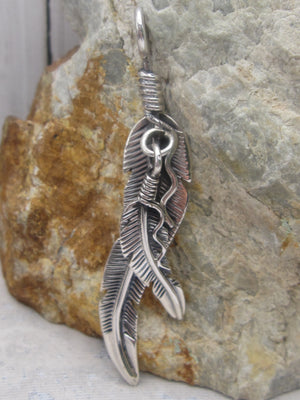 Native American Made Sterling Silver Hand Carved Double Feather Pendant