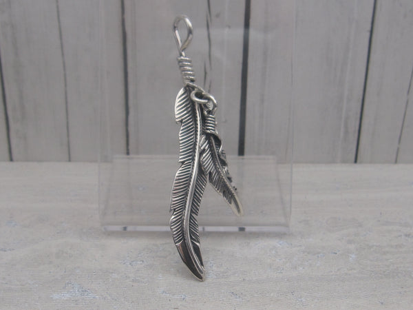 Sterling Silver Hand Carved Double Feather Pendant