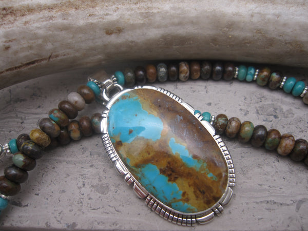 Native American Made Blue Turquoise and Sterling Silver Pendant on Turquoise and Sterling Silver Beaded Necklace