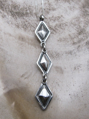 Repousse Dangle Pendant