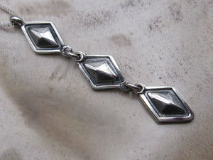 Repousse Dangle Pendant