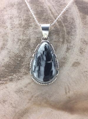 Native American Made White Buffalo and Sterling Silver Pendant by L. Yazzie